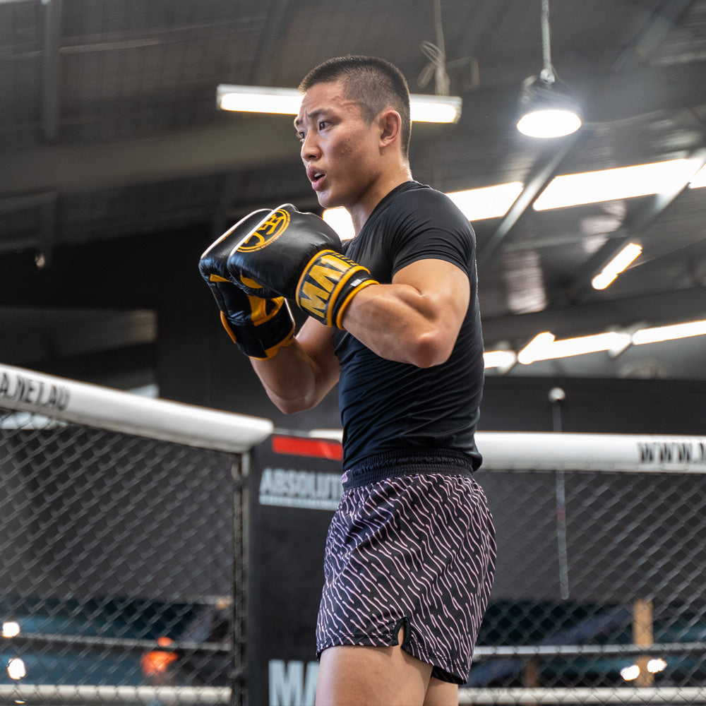 MA1 PINK AND BLACK PATTERNED MMA SHORTS